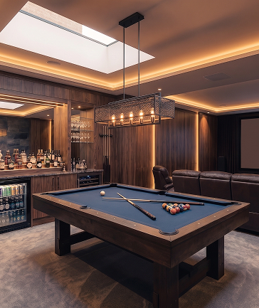 The residents’ club room with a pool table and bar