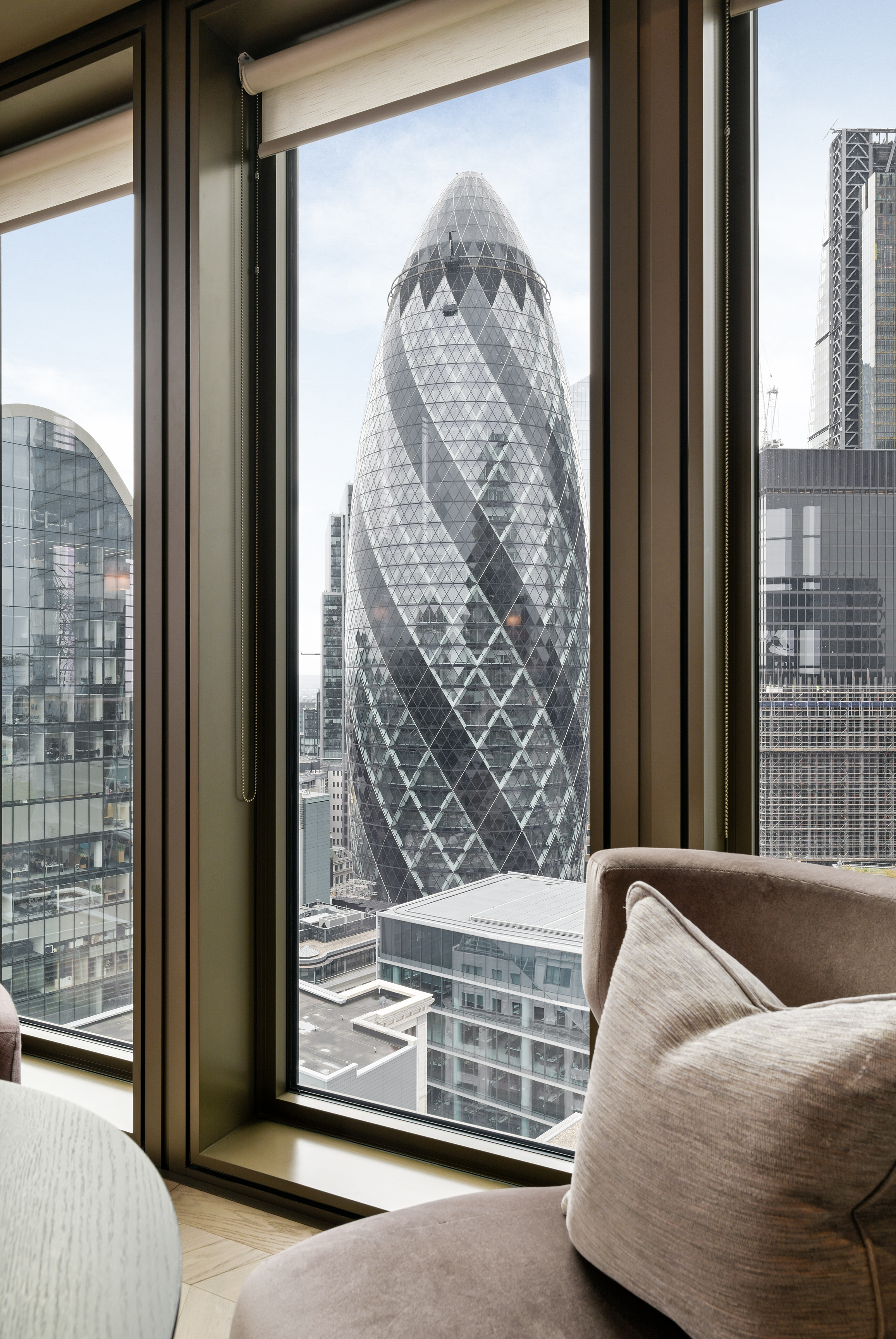 The Gherkin framed by a residence window